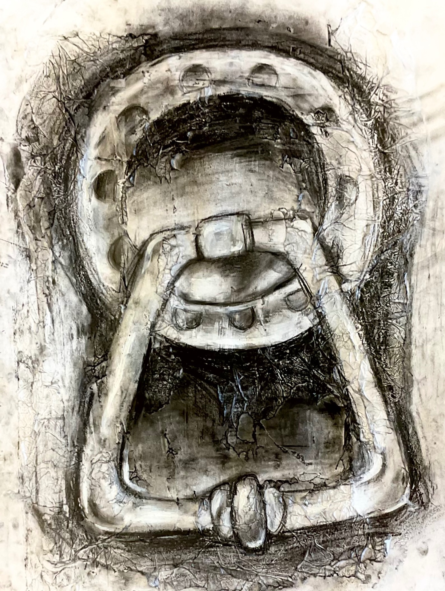 Mixed media drawing of a curled figure in charcoal and paper